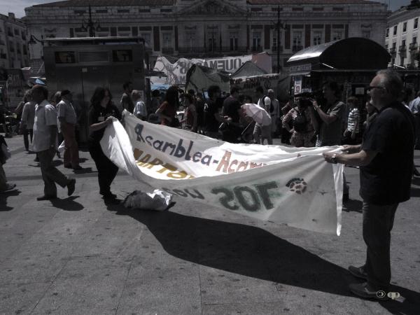 Desmontando Acampada SOL (Detalle)